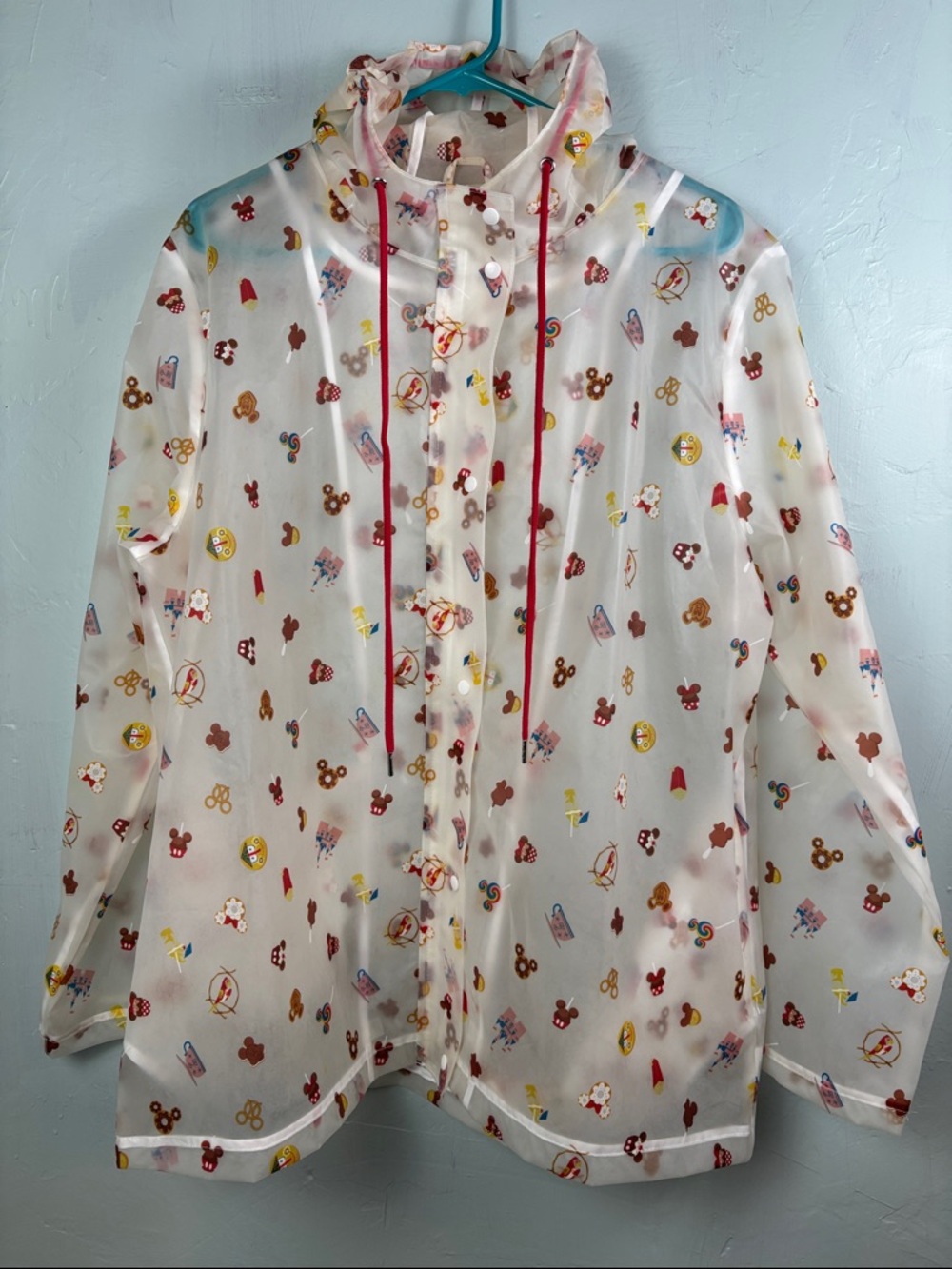 Disney Parks Hooded Raincoat, White and Red w/ Snacks and Icons design.